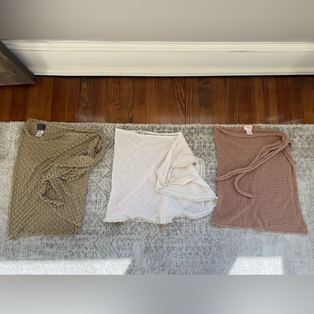 3 sarongs. From right to left: Elif. Robin Piccone. Camila Coelho.